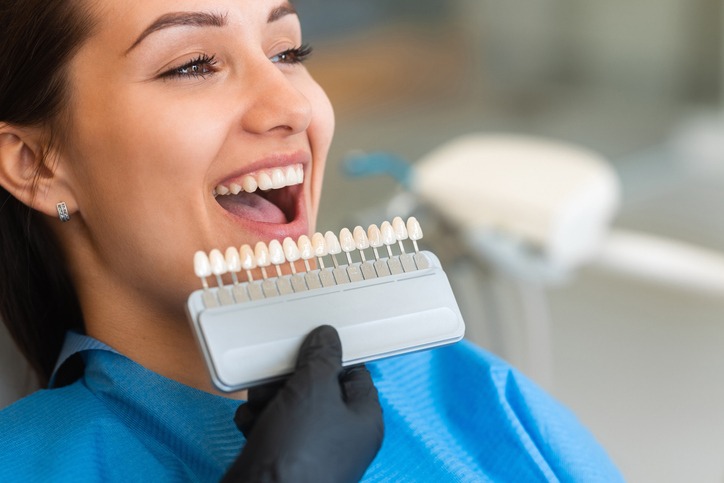 Woman smiling with Invisalign from cosmetic treatment at Community Roots Family Dentistry in Brecksville & Nearby Areas